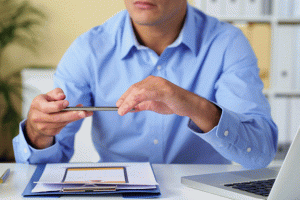 man reviewing documents